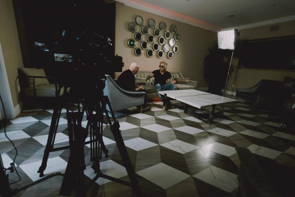 MATT PINFIELD MATT SORUM WIDE SHOT WITH CAMERA IN FRAME