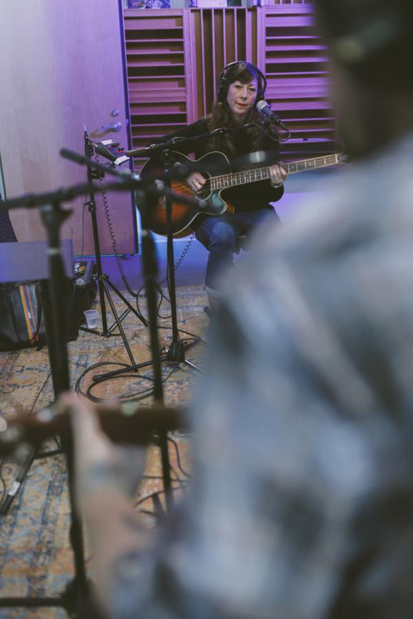 wide shot of nikki monniger over the shoulder of brian from Silversun Pickups